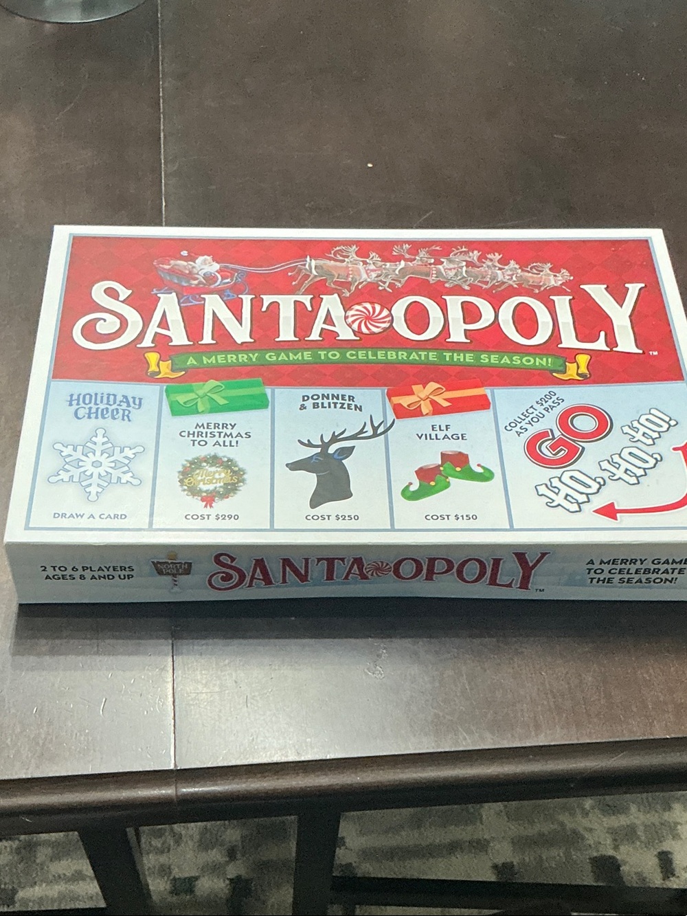 Santa-Opoly Holiday Board Game by Late for the Sky Productions - Red and White